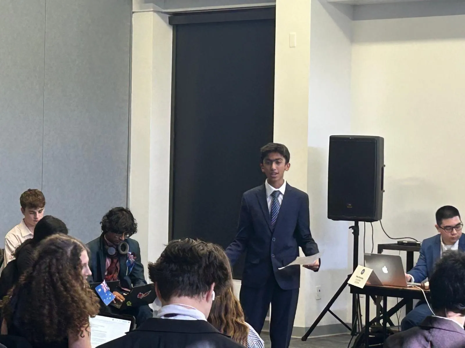 Anish speaking in a Model UN committee
